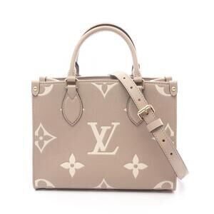 Louis Vuitton On the Go Two Tone Handbag Empreinte Leather Beige Tan Ivory White